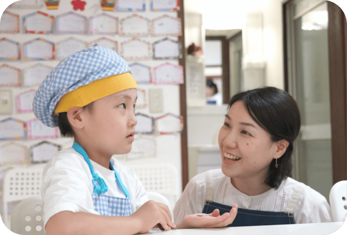 材料費の計算をする子ども